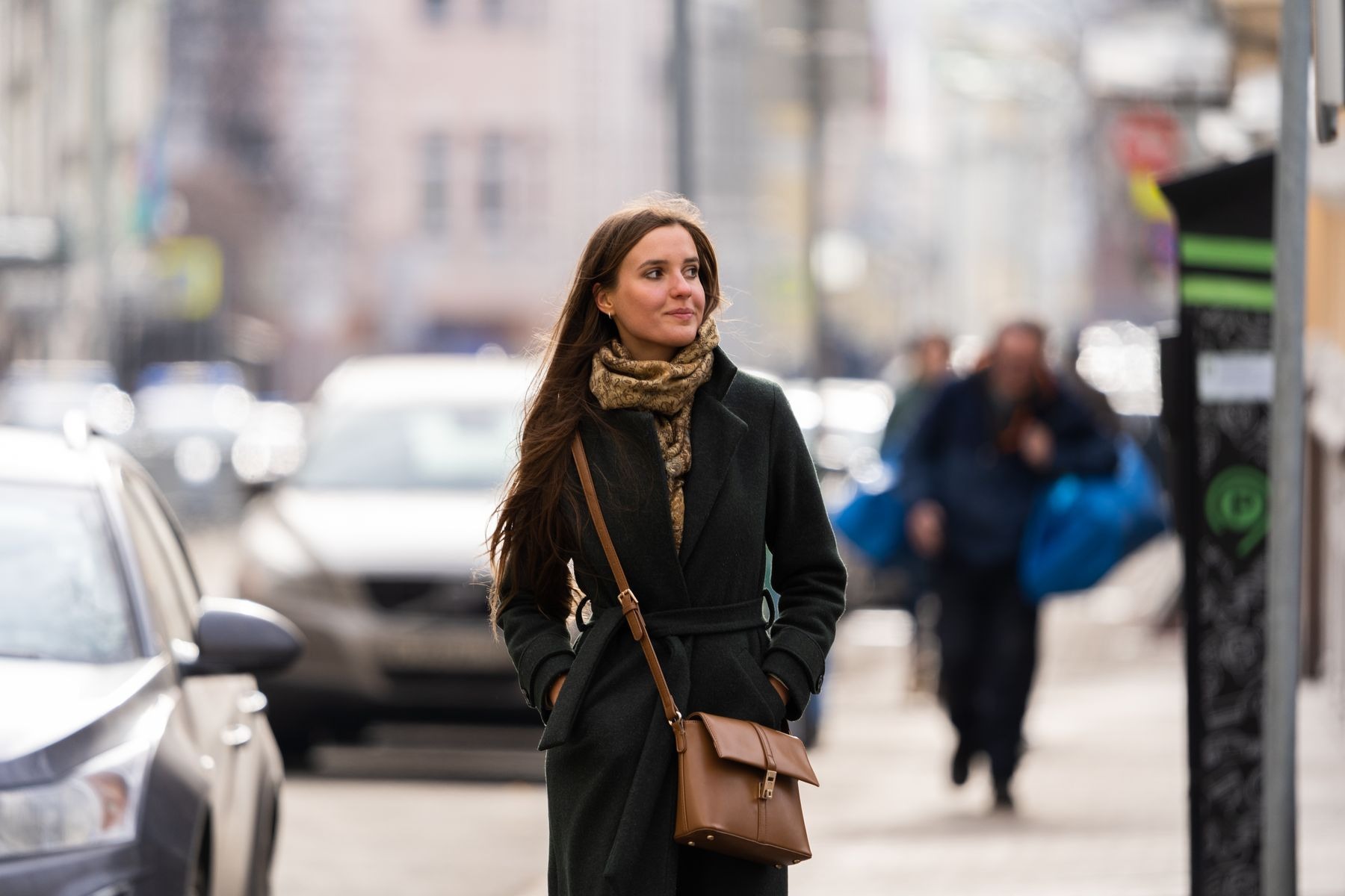 How to Adjust a Crossbody Bag Strap for Coats and Dresses