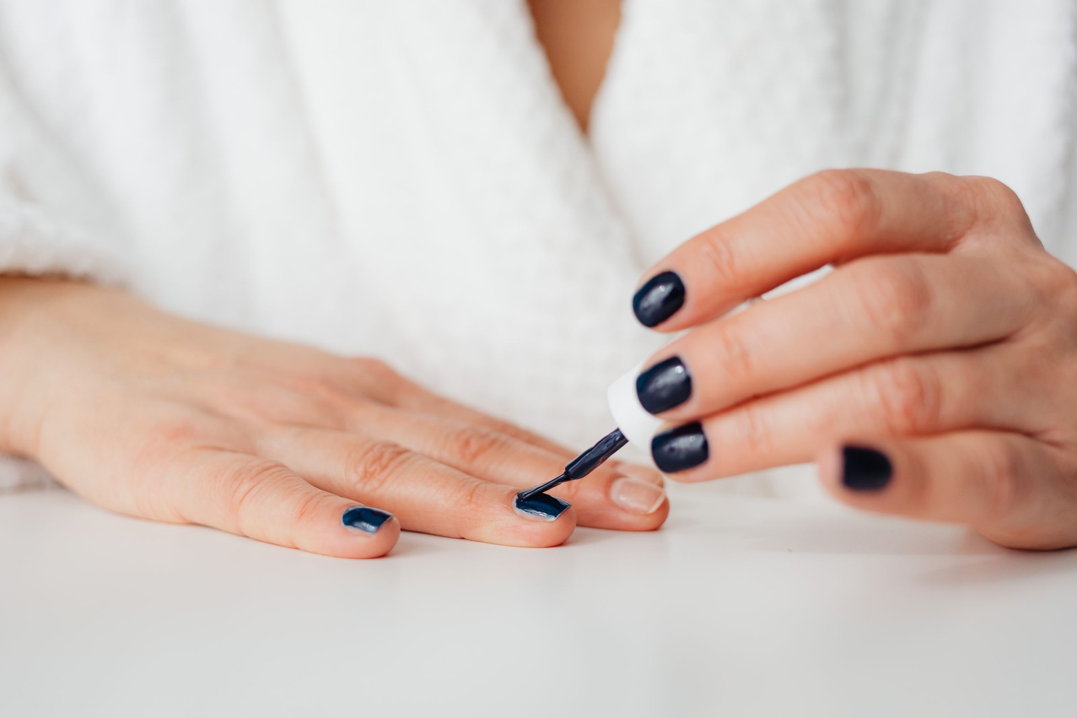 Neater Nail Polish With Thin Coats and a Small Margin at the Edge