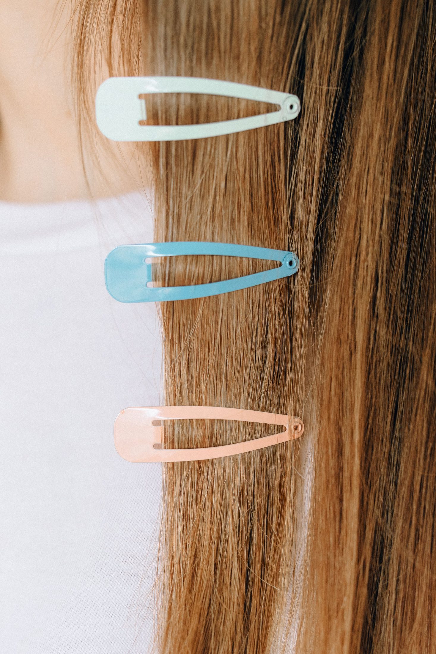 A Polished Hair Finish From a Simple Part and One Good Accessory